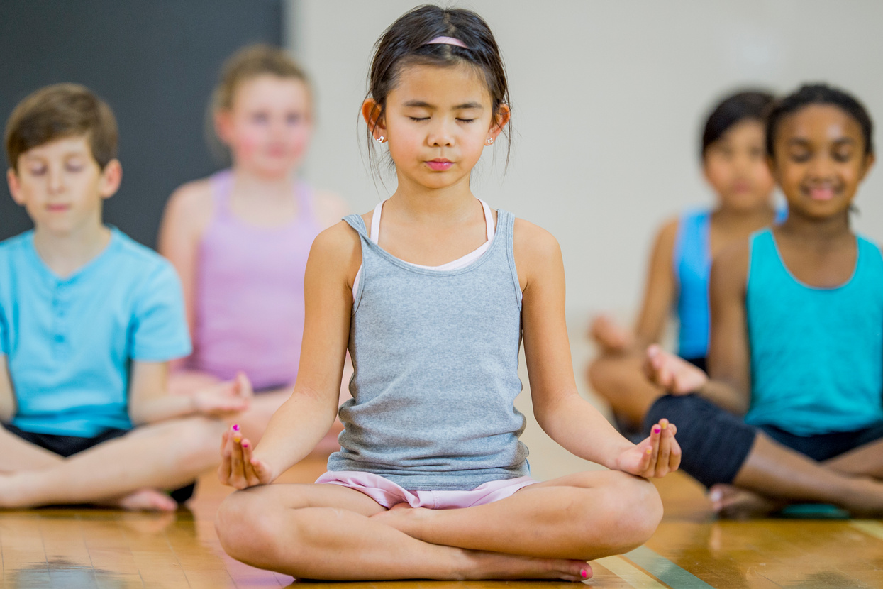 Children meditating at school