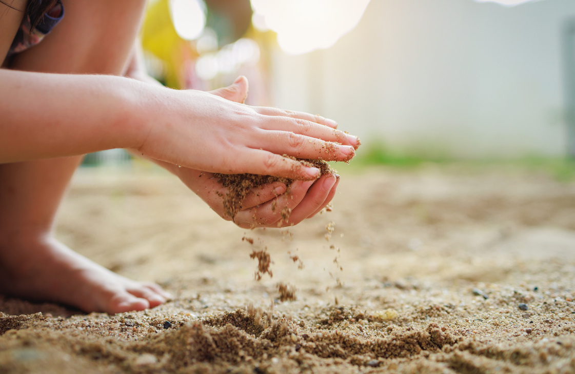 Kids playing sands. This activity is good for children sensory experience